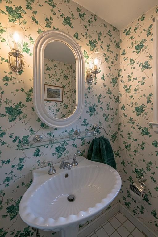30 Pickwick Road Marblehead, MA 01945 - Photo 8 of 18 a bathroom with a sink and mirror