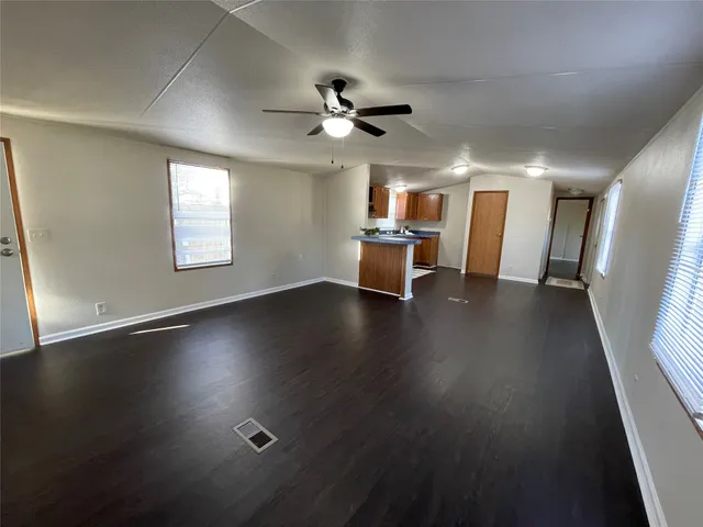 a view of livingroom with furniture wooden floor and window