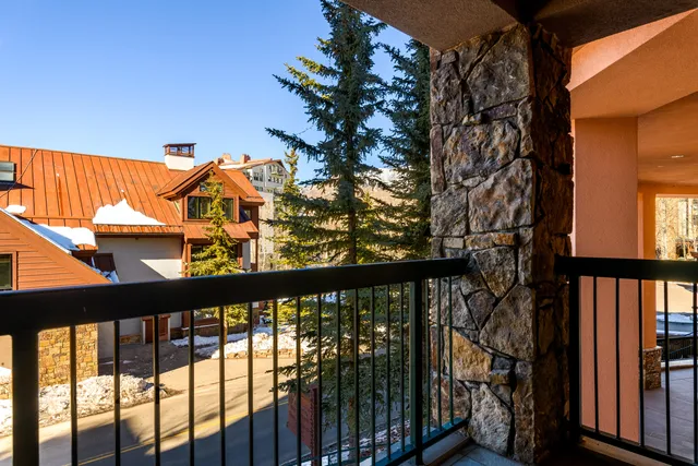 a view of a balcony with a swing