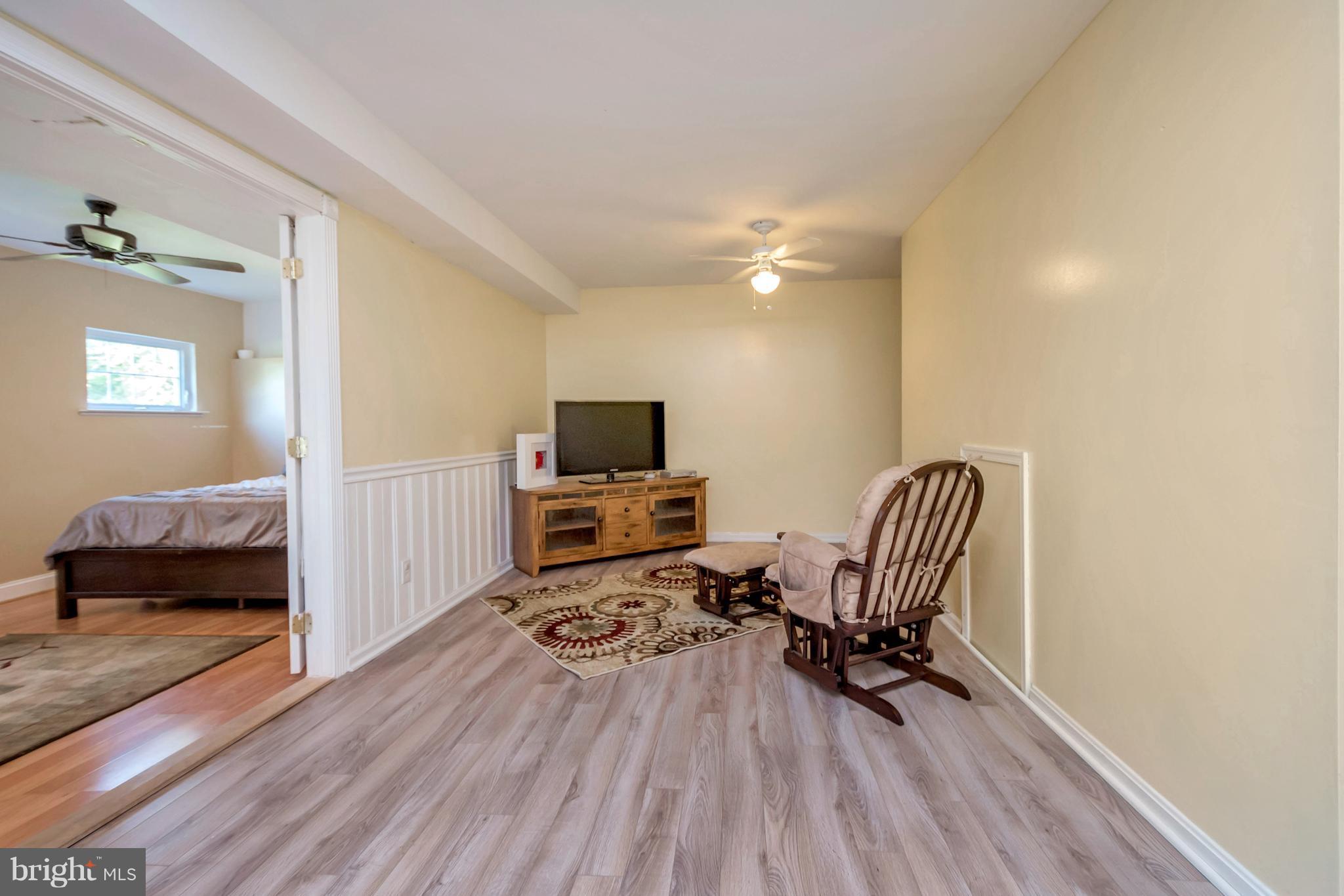 13347 Sillamon Road Goldvein, VA 22720 - Photo 24 of 28 Basement living area!