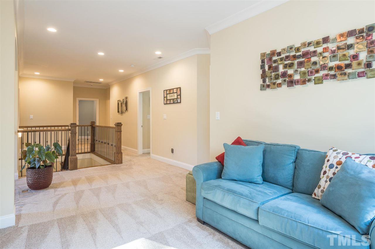 4713 Preserve Road Raleigh, NC 27610 - Photo 22 of 30 a living room with furniture