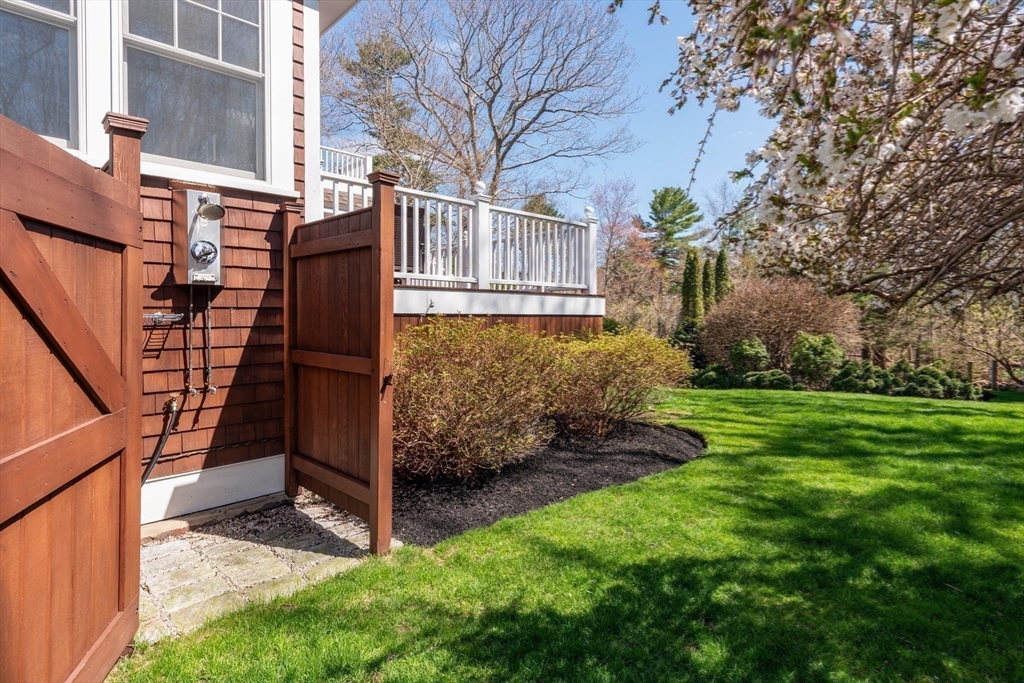 37 Forster Road Manchester, MA 01944 - Photo 12 of 42 a view of backyard with a garden and trees
