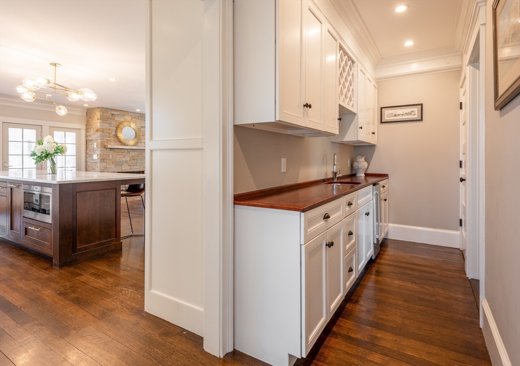 37 Forster Road Manchester, MA 01944 - Photo 20 of 42 a kitchen with stainless steel appliances granite countertop a stove and a refrigerator