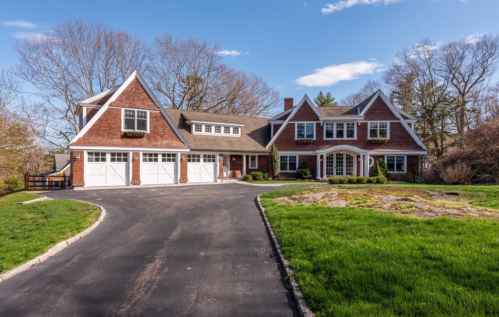 37 Forster Road Manchester, MA 01944 - Photo 2 of 42 a front view of residential houses with yard and green space