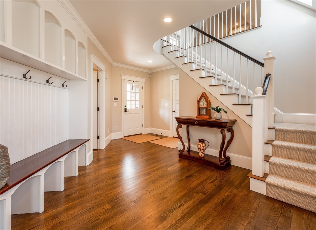 37 Forster Road Manchester, MA 01944 - Photo 22 of 42 a view of entryway with wooden floor and stairs