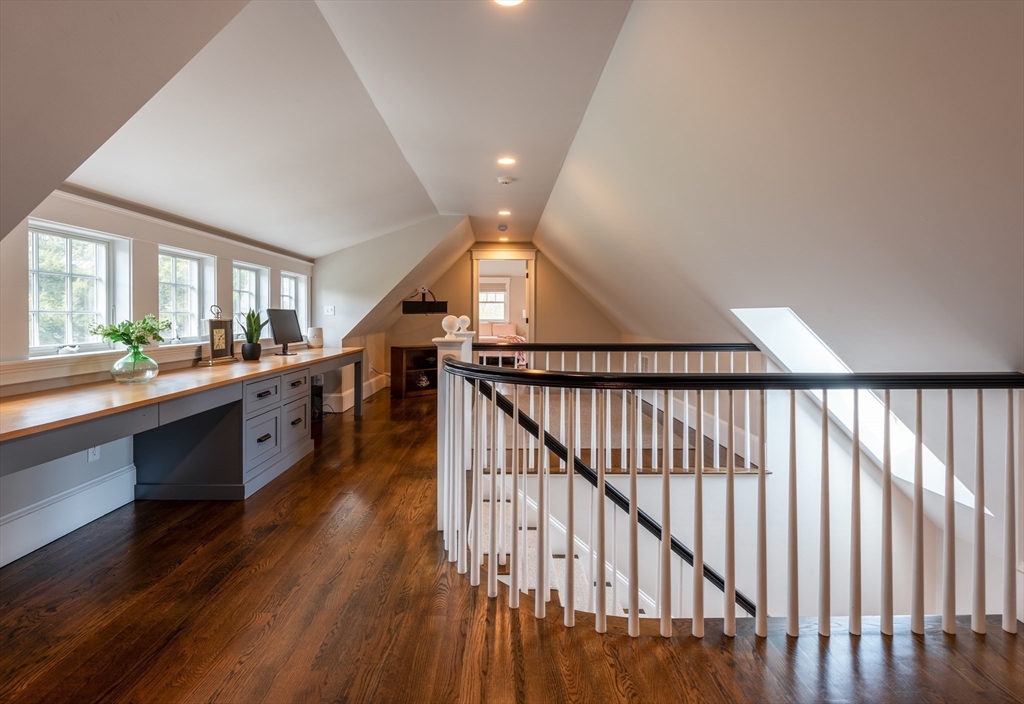 37 Forster Road Manchester, MA 01944 - Photo 23 of 42 a large white kitchen with wooden floor and a large window