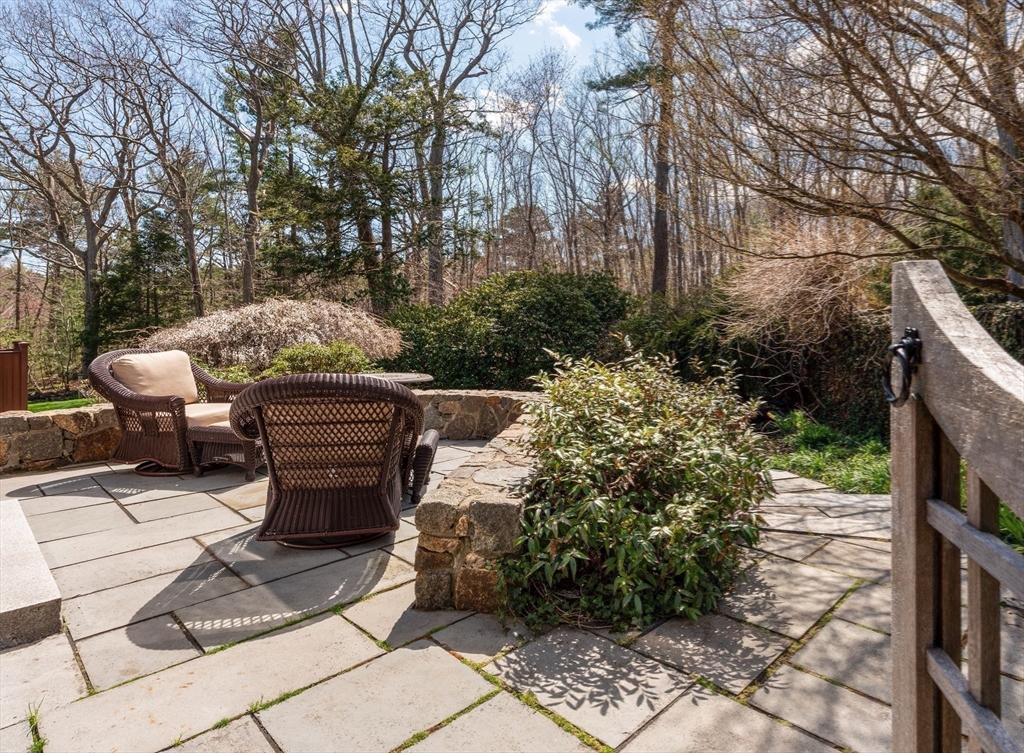 37 Forster Road Manchester, MA 01944 - Photo 10 of 42 a view of a backyard with sitting area