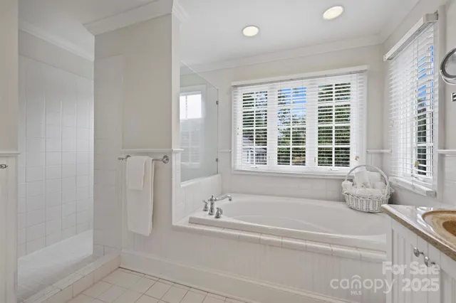 a bathroom with sink and bathtub