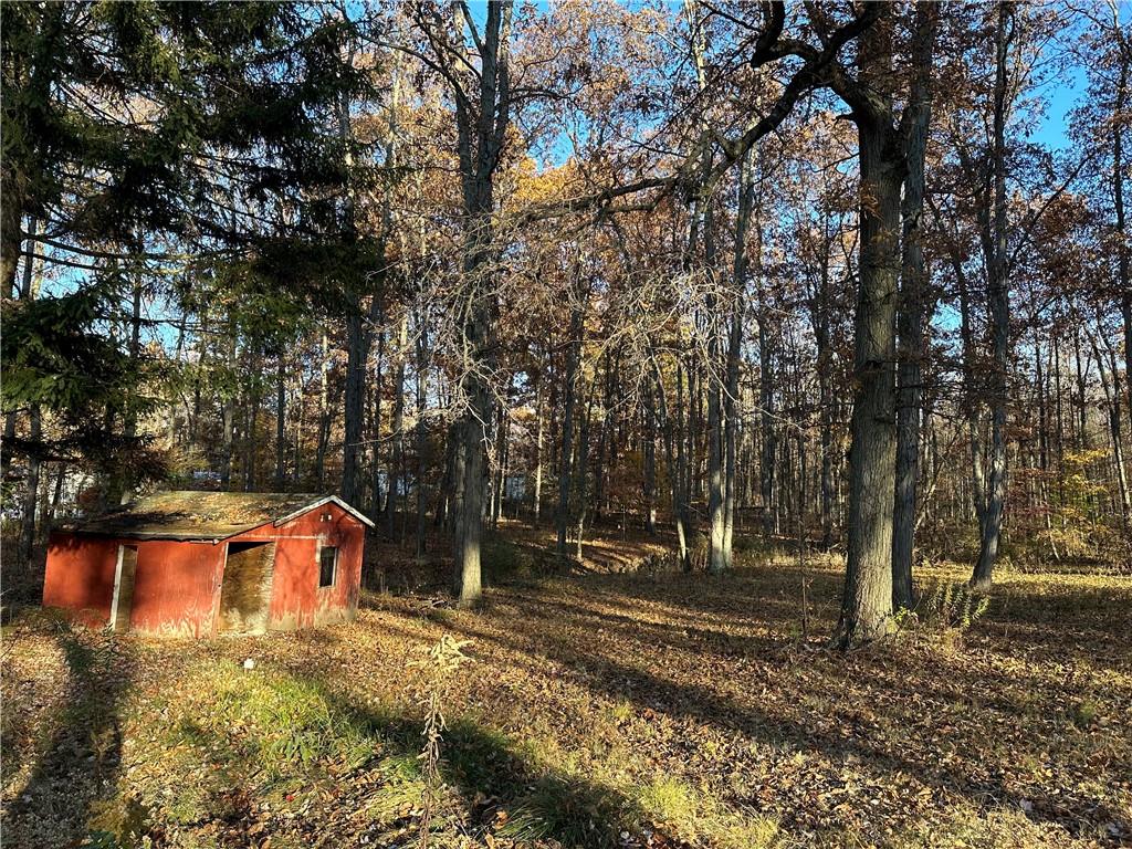 147 Wilson Road Prospect, PA 16052 - Photo 5 of 6 a view of a yard with large trees