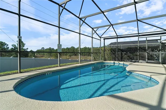 a view of outdoor space with swimming pool
