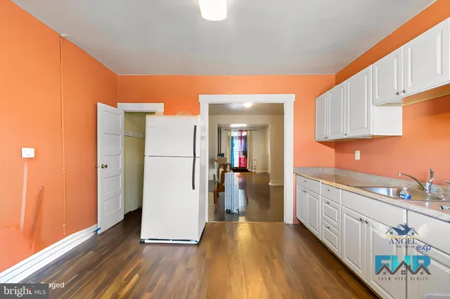 a view of a workspace with furniture