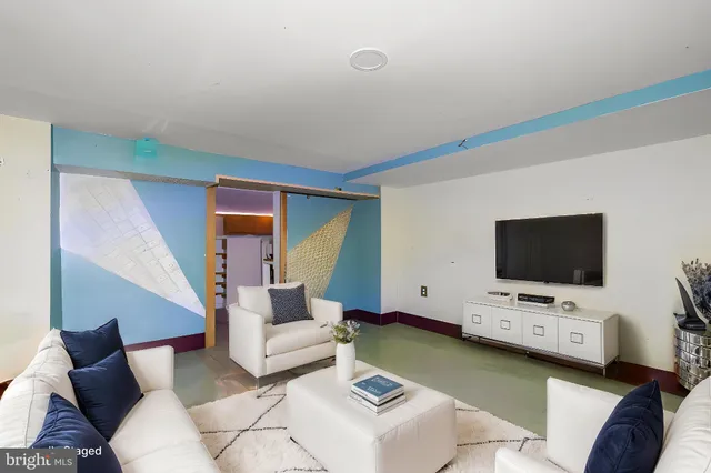 a kitchen with a sink and a refrigerator