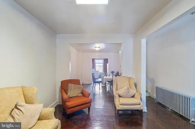 a living room with furniture or couch and a window