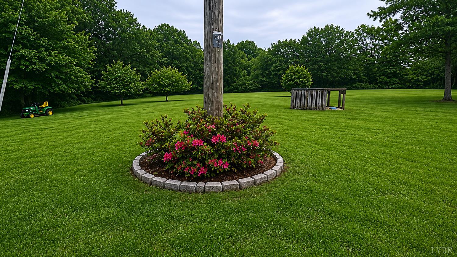 2346 Mitchell Mill Road Gladys, VA 24554 - Photo 26 of 38 a view of a garden with a swimming pool
