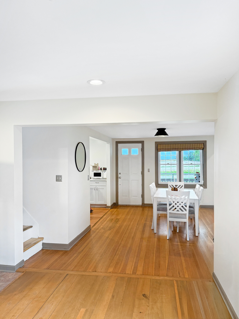 30789 East Five Points Road Kingston, IL 60145 - Photo 16 of 26 a bedroom with a bed and a large window