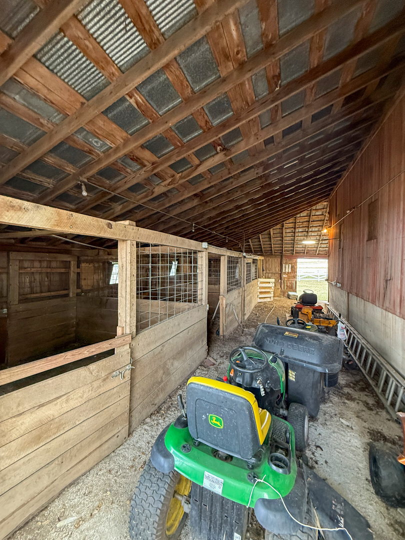 30789 East Five Points Road Kingston, IL 60145 - Photo 21 of 26 a car parked in front of a house