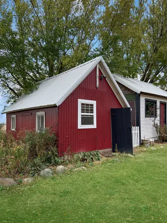 a view of a yard with an outdoor space