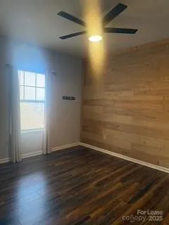 a bathroom with a granite countertop bathtub toilet and sink