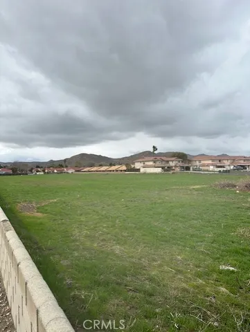 a view of a lake with a big yard