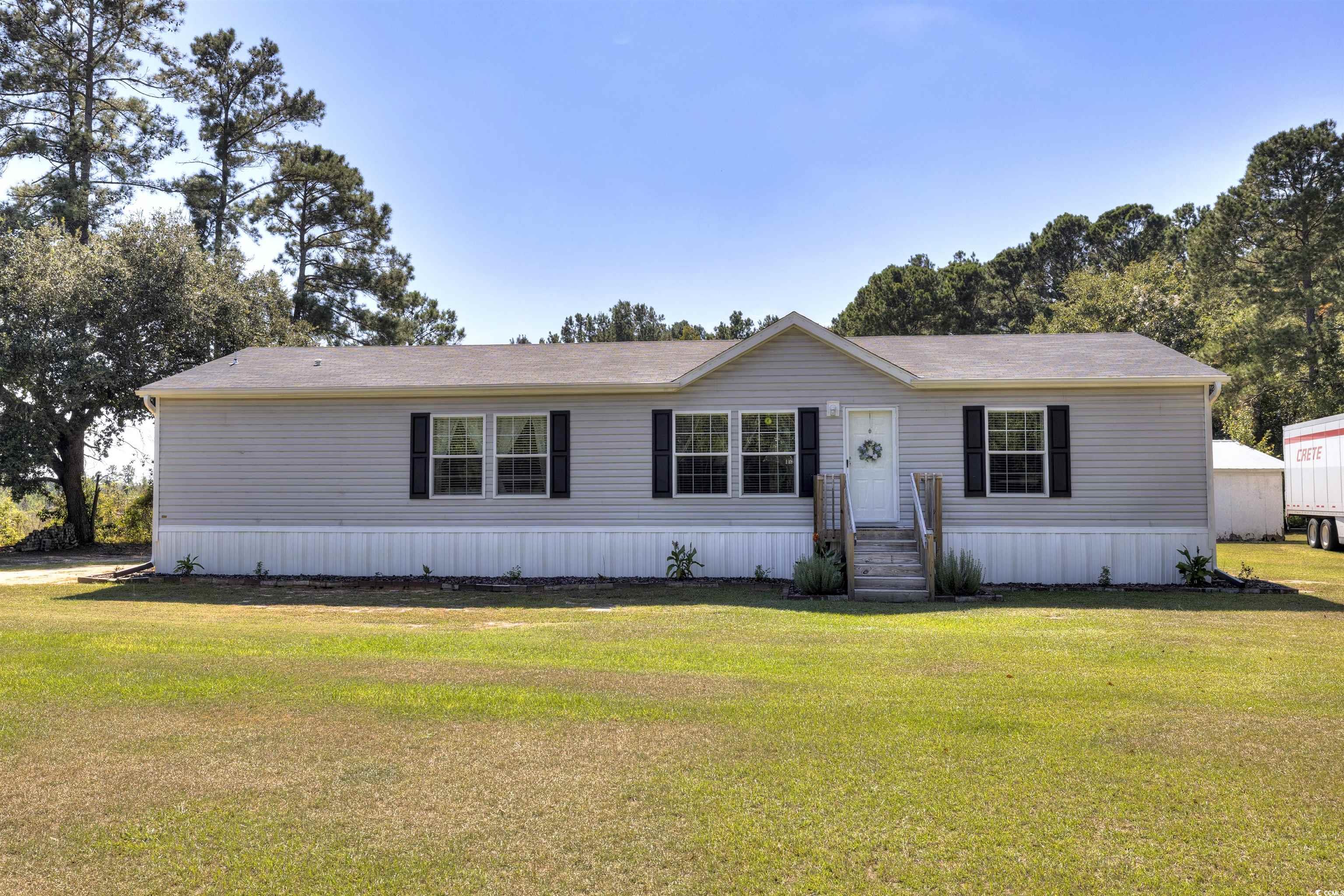 4520 Huggins Road Lake City, SC 29560 - Photo 2 of 40 Manufactured / mobile home with a front lawn