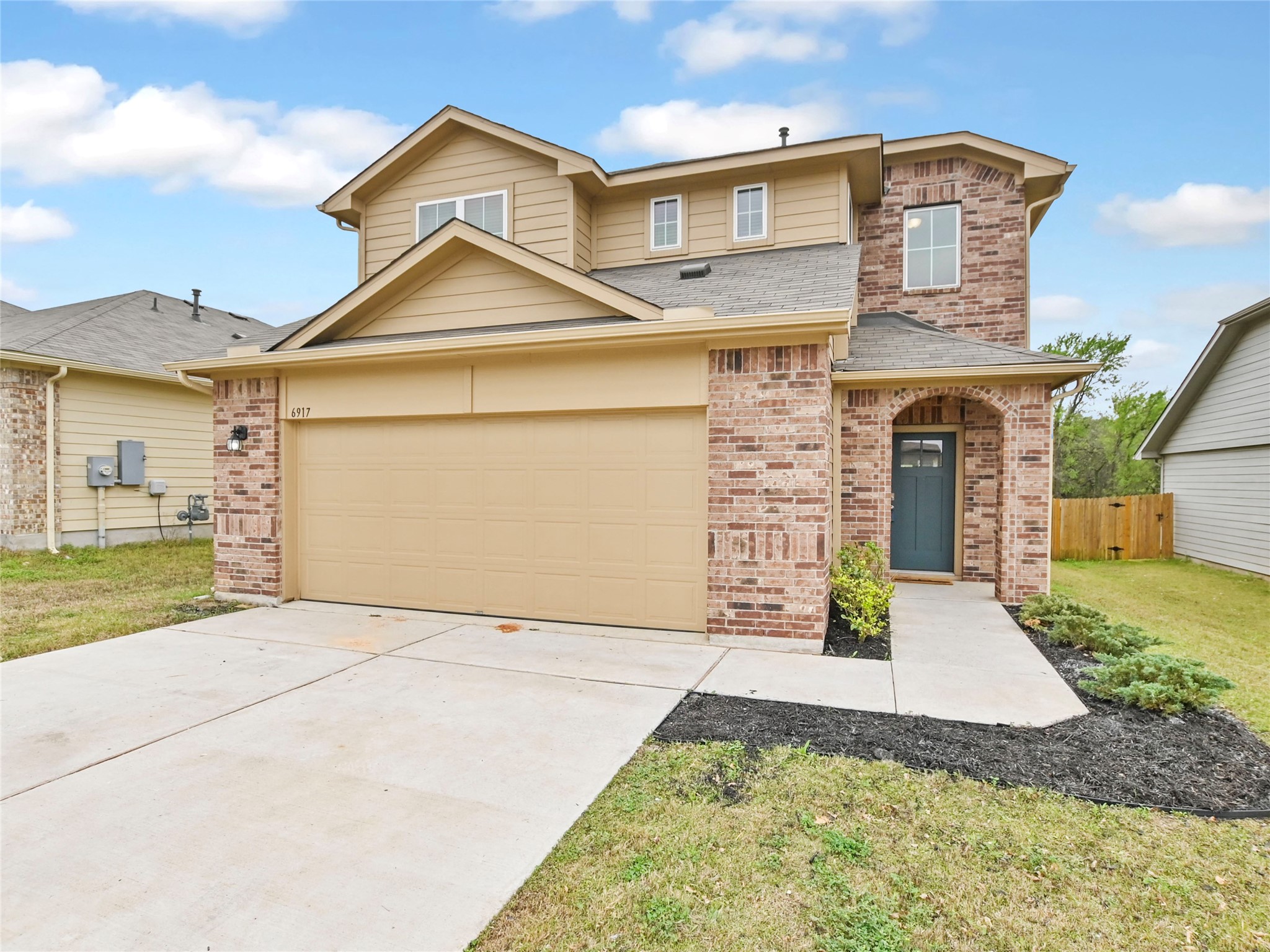 Inviting 2 story home, backs to green space,  and has full sprinkler system