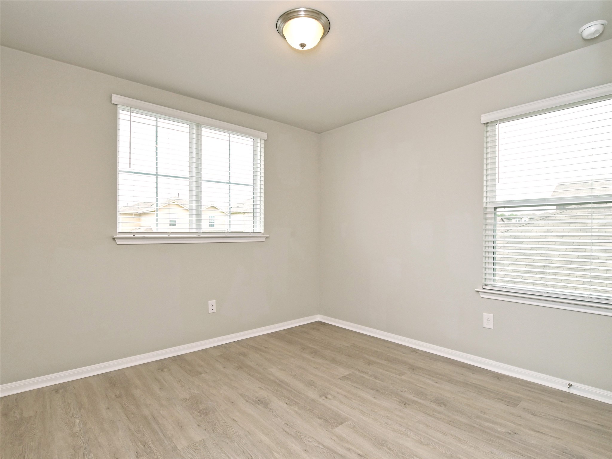 6917 Ranchito Drive Austin, TX 78744 - Photo 20 of 29 2nd floor, 2nd Bedroo has attractive LVP flooring