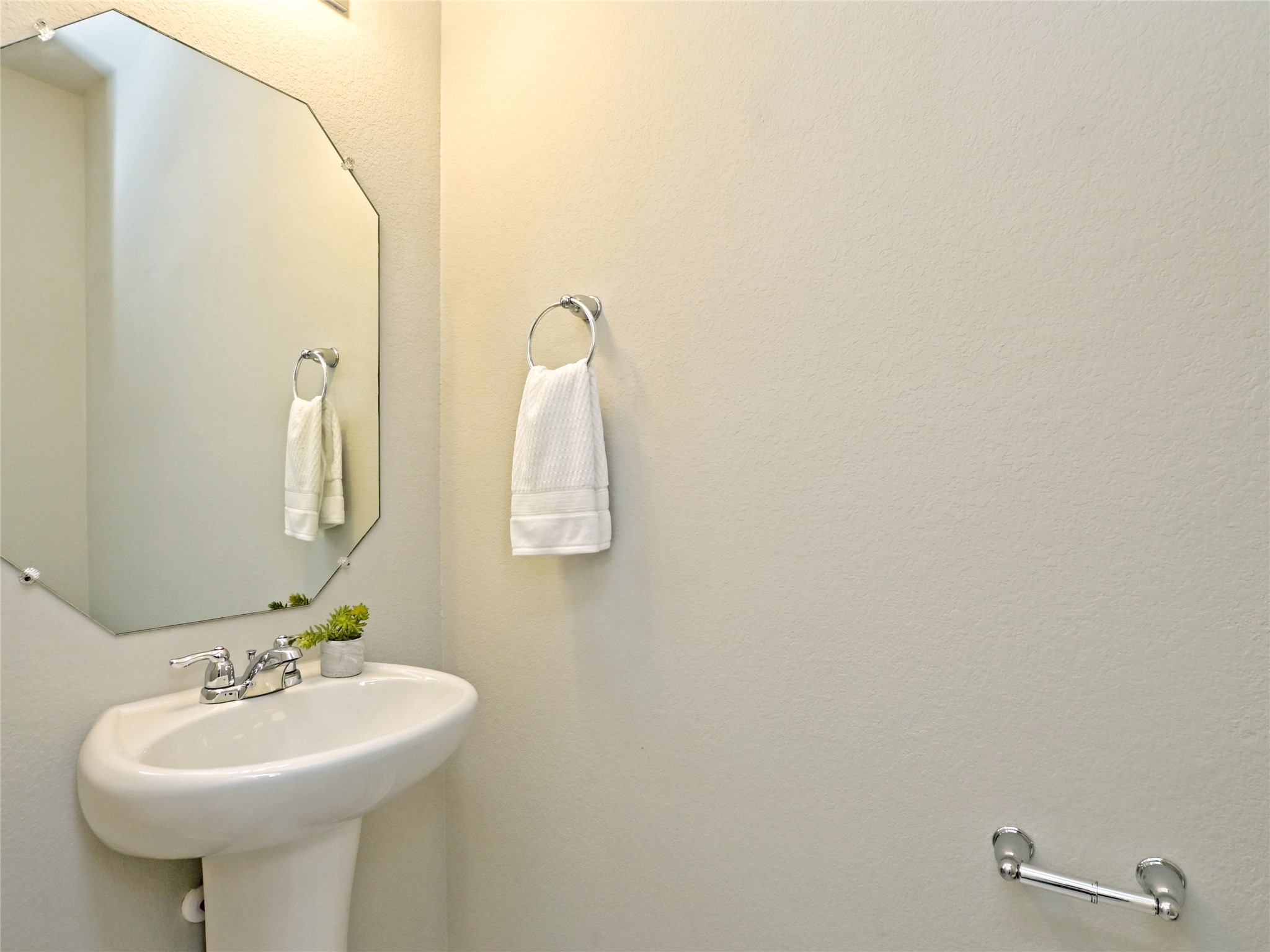 6917 Ranchito Drive Austin, TX 78744 - Photo 23 of 29 Powder Bath on the main floor