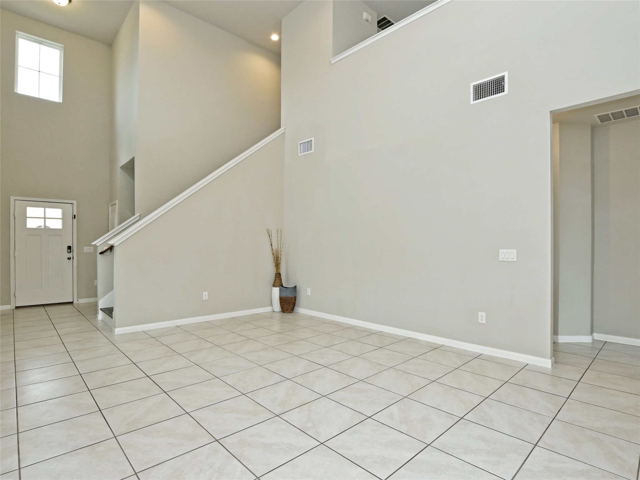 6917 Ranchito Drive Austin, TX 78744 - Photo 4 of 29 Spacious room that also opens to the second floor living.