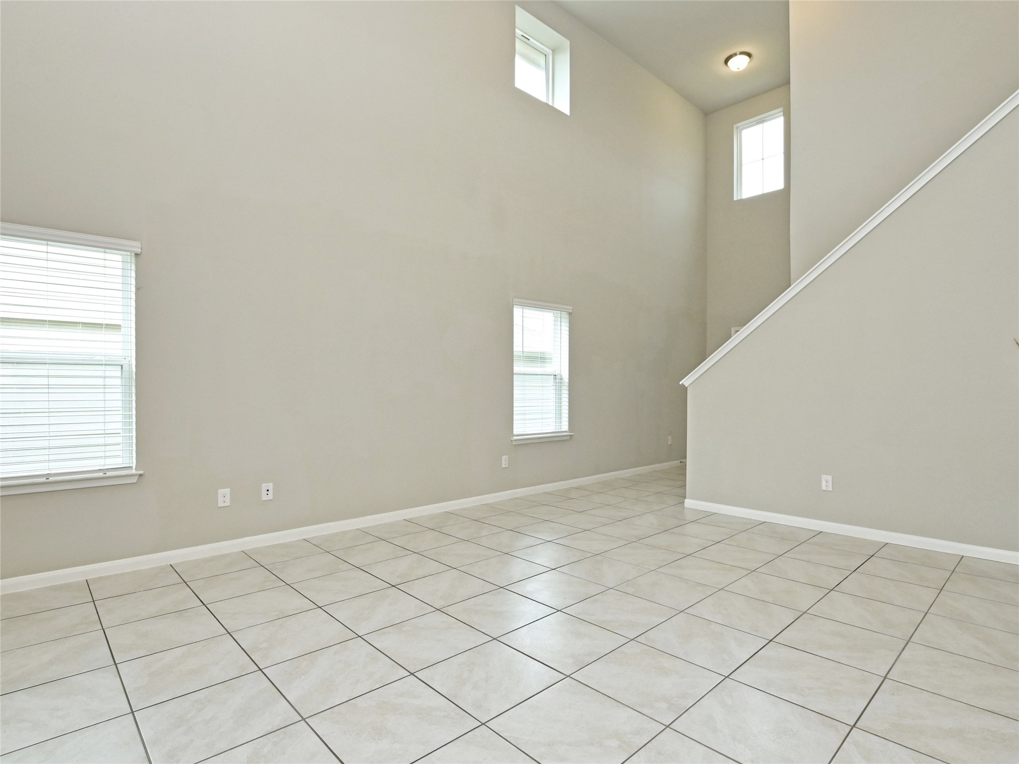 6917 Ranchito Drive Austin, TX 78744 - Photo 5 of 29 Easy care tile flooring and many windows.
