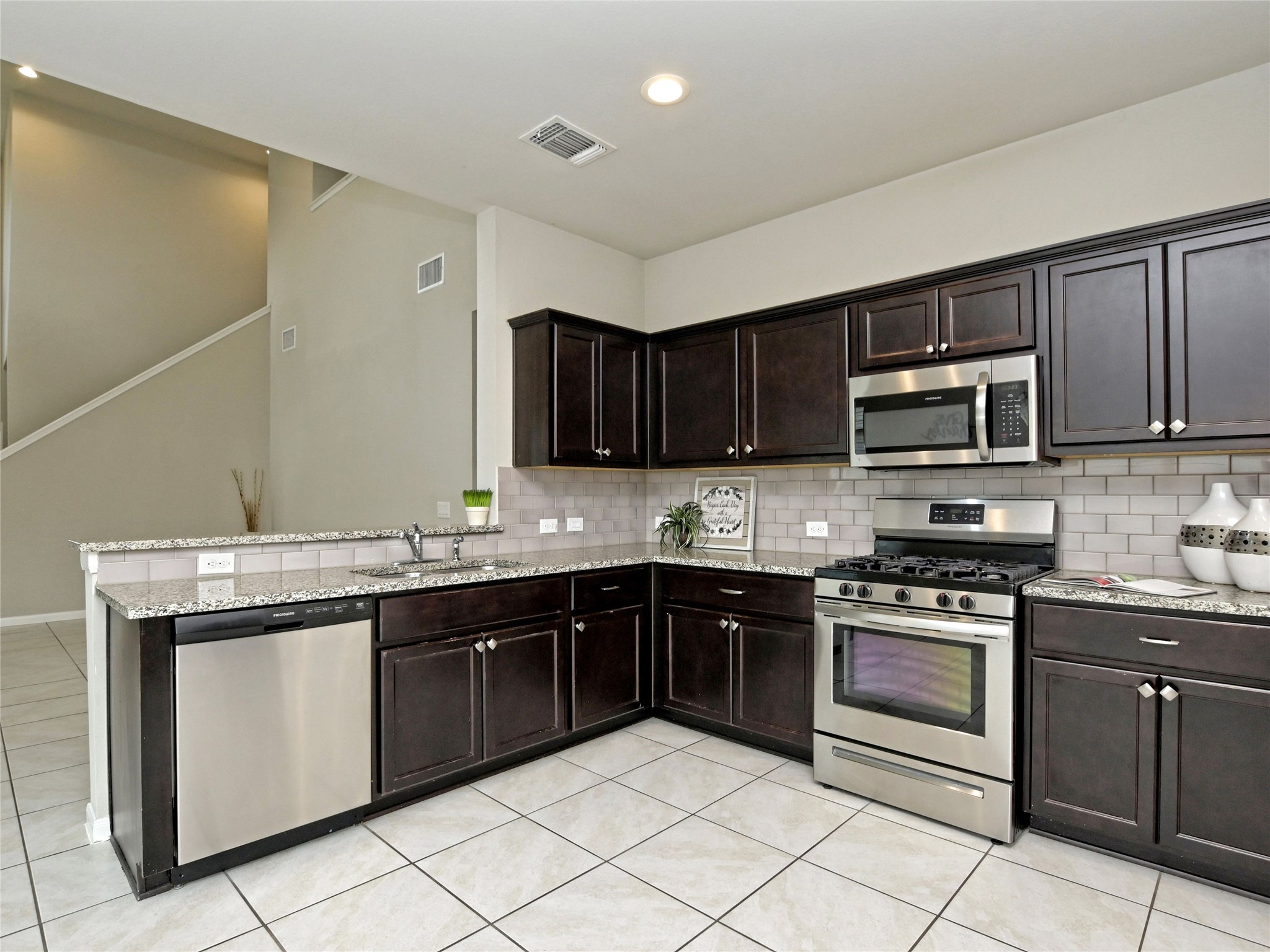 6917 Ranchito Drive Austin, TX 78744 - Photo 6 of 29 Large kitchen with full appliances, including refrigerator