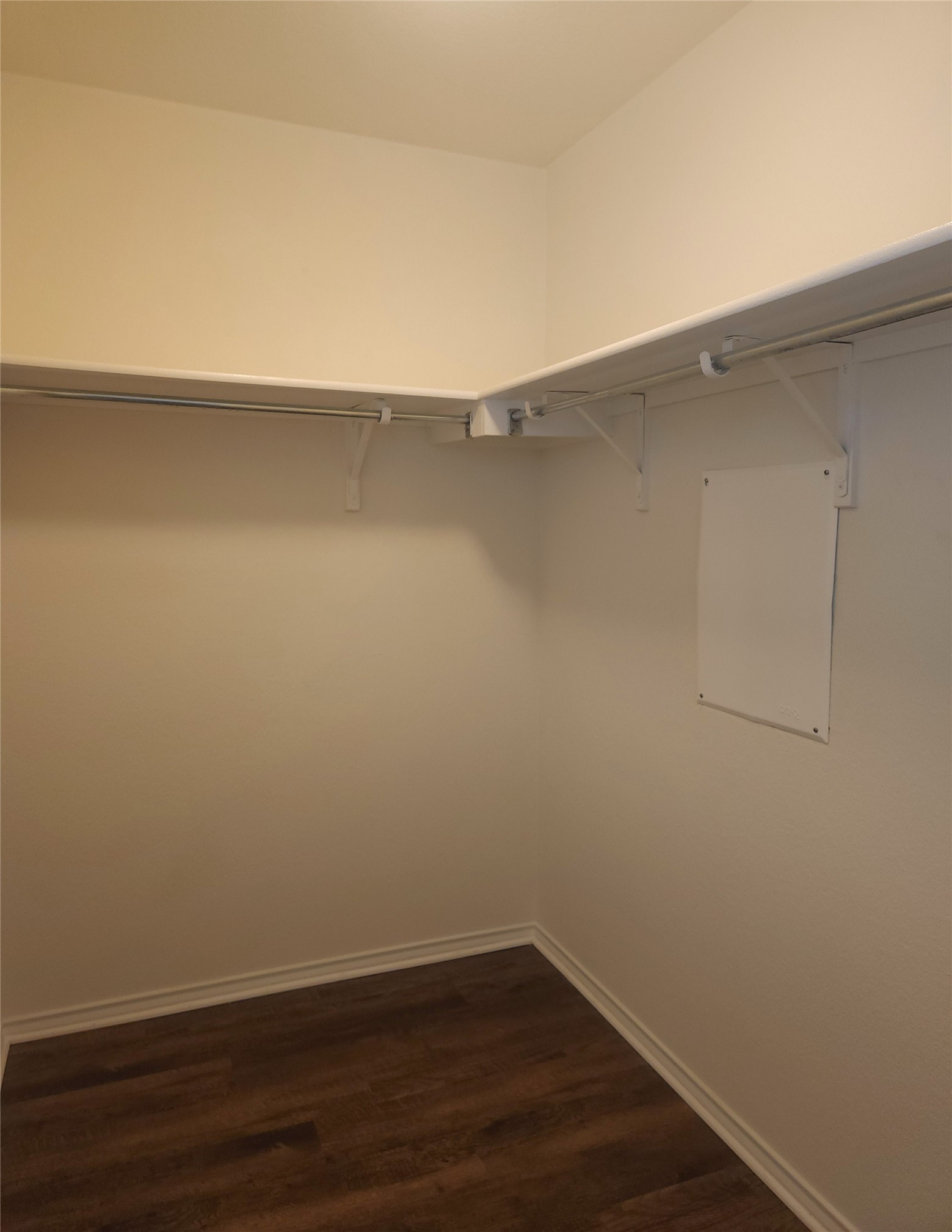 160 Rummel Drive Kyle, TX 78640 - Photo 7 of 13 Integrated shelving and clothing rods provide convenient organization in this closet.