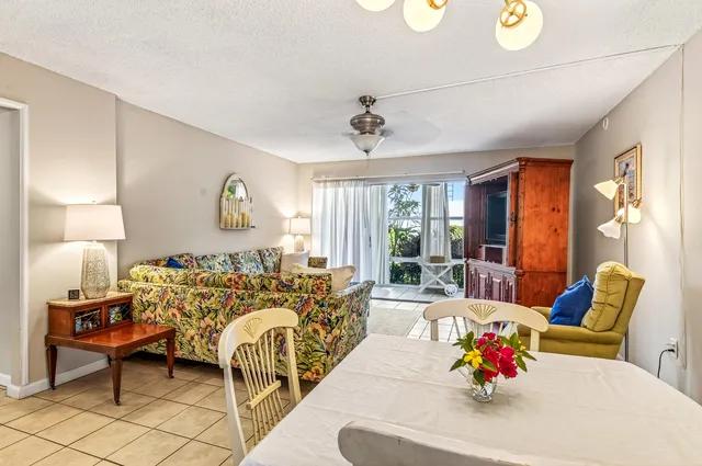 a bed room with furniture and wooden floor
