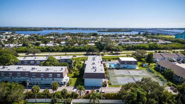 an aerial view of a house with a garden