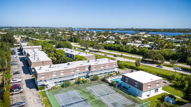 an aerial view of a house with a garden