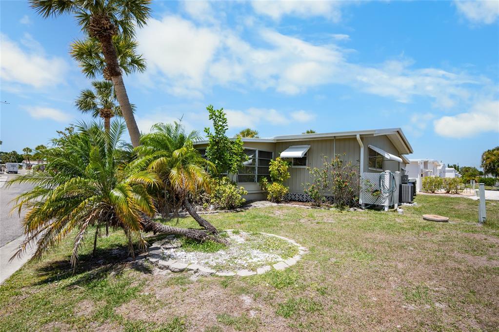 5751 Hyacinth Road Venice, FL 34293 - Photo 32 of 44 a view of a house with a patio