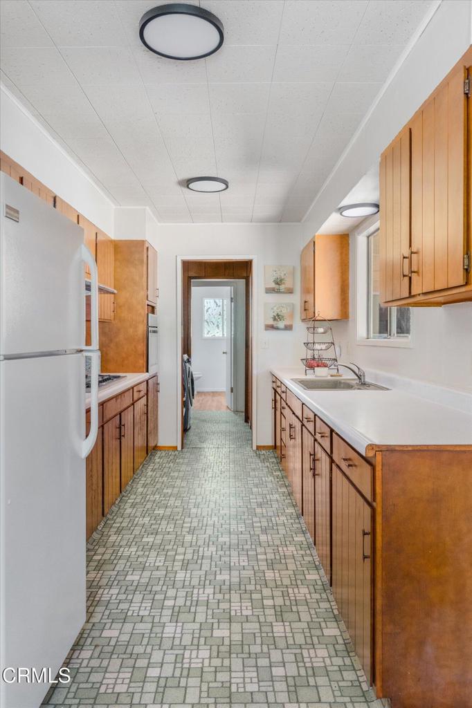 2660 Independence Road Mokelumne Hill, CA 95245 - Photo 9 of 37 a kitchen with stainless steel appliances granite countertop a sink stove and refrigerator