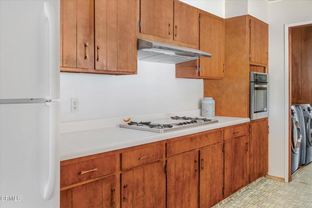 2660 Independence Road Mokelumne Hill, CA 95245 - Photo 10 of 37 a stove top oven sitting inside of a kitchen