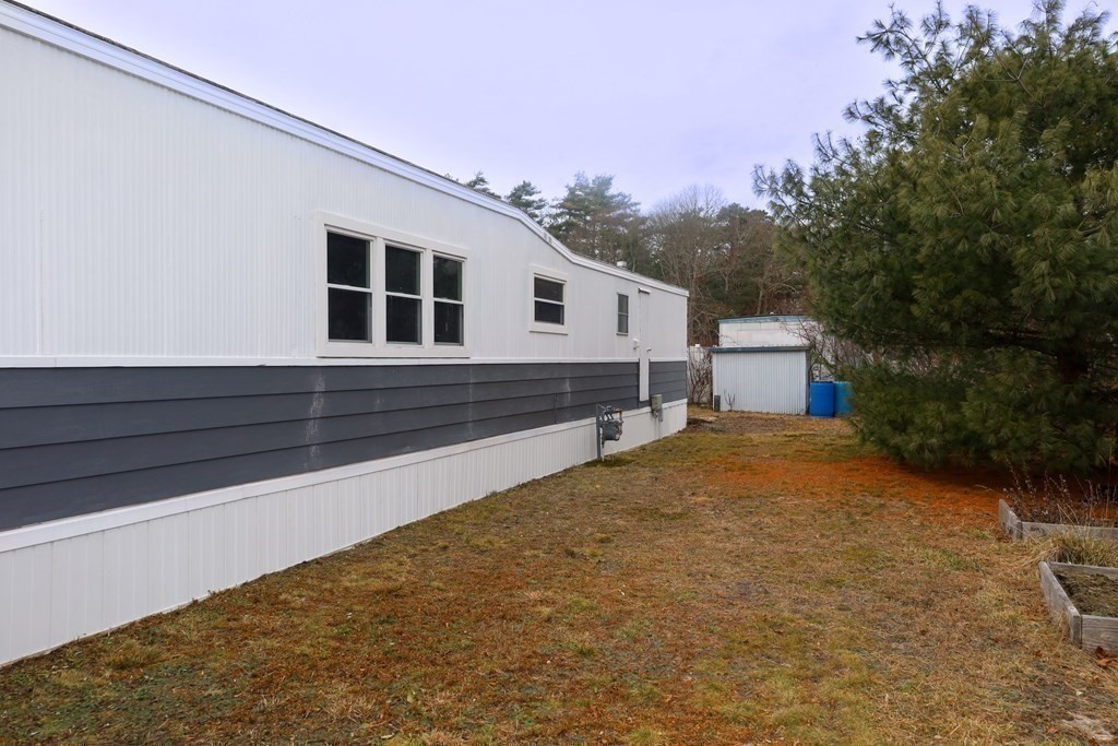 26 Claudia Street Wareham, MA 02538 - Photo 16 of 17 a house view with a backyard space