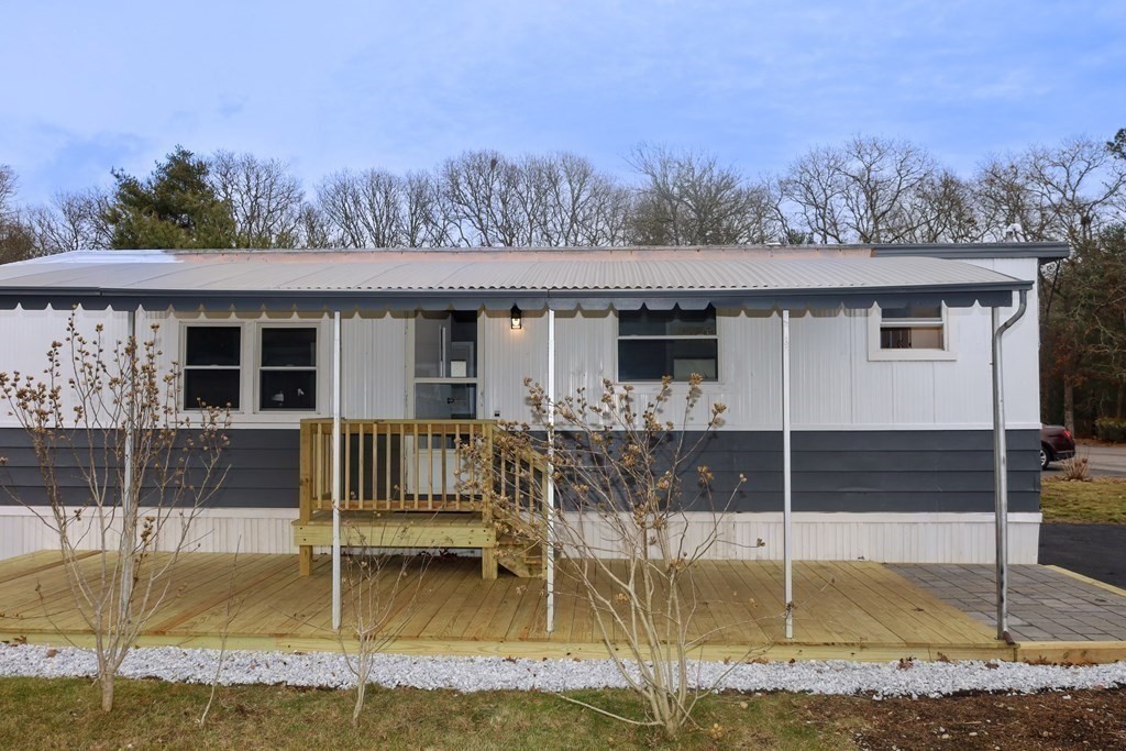 26 Claudia Street Wareham, MA 02538 - Photo 2 of 17 a front view of a house with garden
