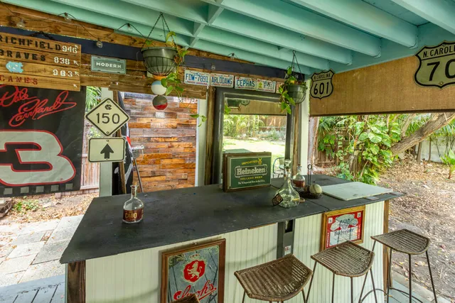 a table with chairs and a stove