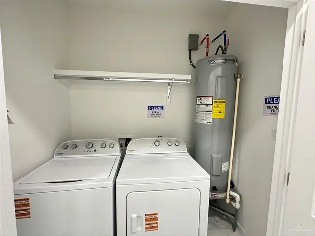 a utility room with dryer and washer
