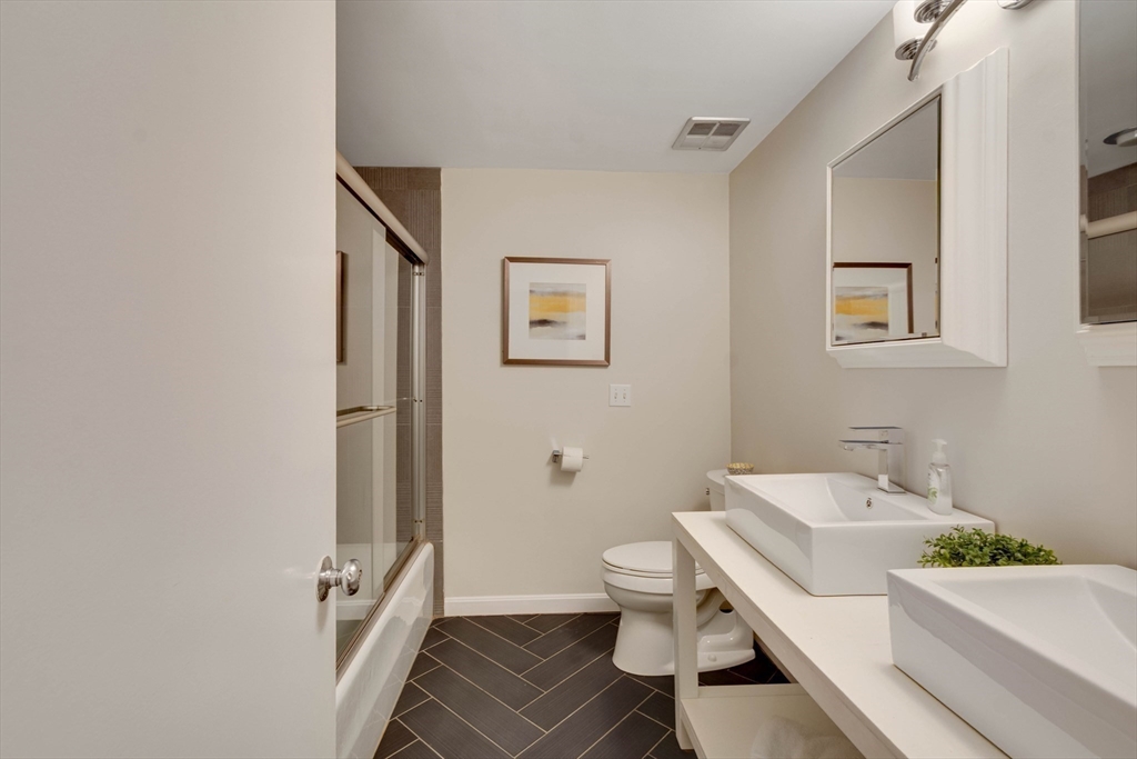 134 Chestnut Circle, Unit 134 Lincoln, MA 01773 - Photo 22 of 38 a bathroom with a sink and toilet
