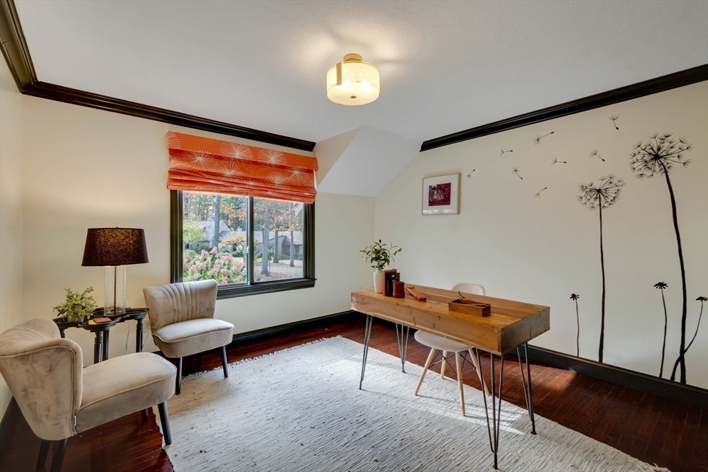 134 Chestnut Circle, Unit 134 Lincoln, MA 01773 - Photo 23 of 38 a living room with furniture and a window