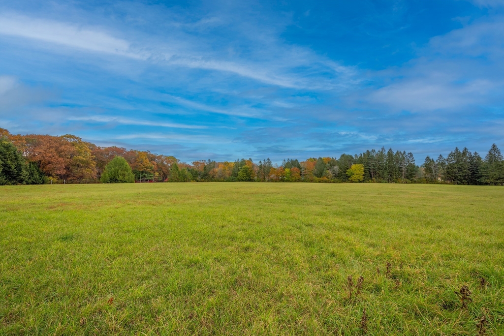 134 Chestnut Circle, Unit 134 Lincoln, MA 01773 - Photo 37 of 38 a view of an ocean and a mountain