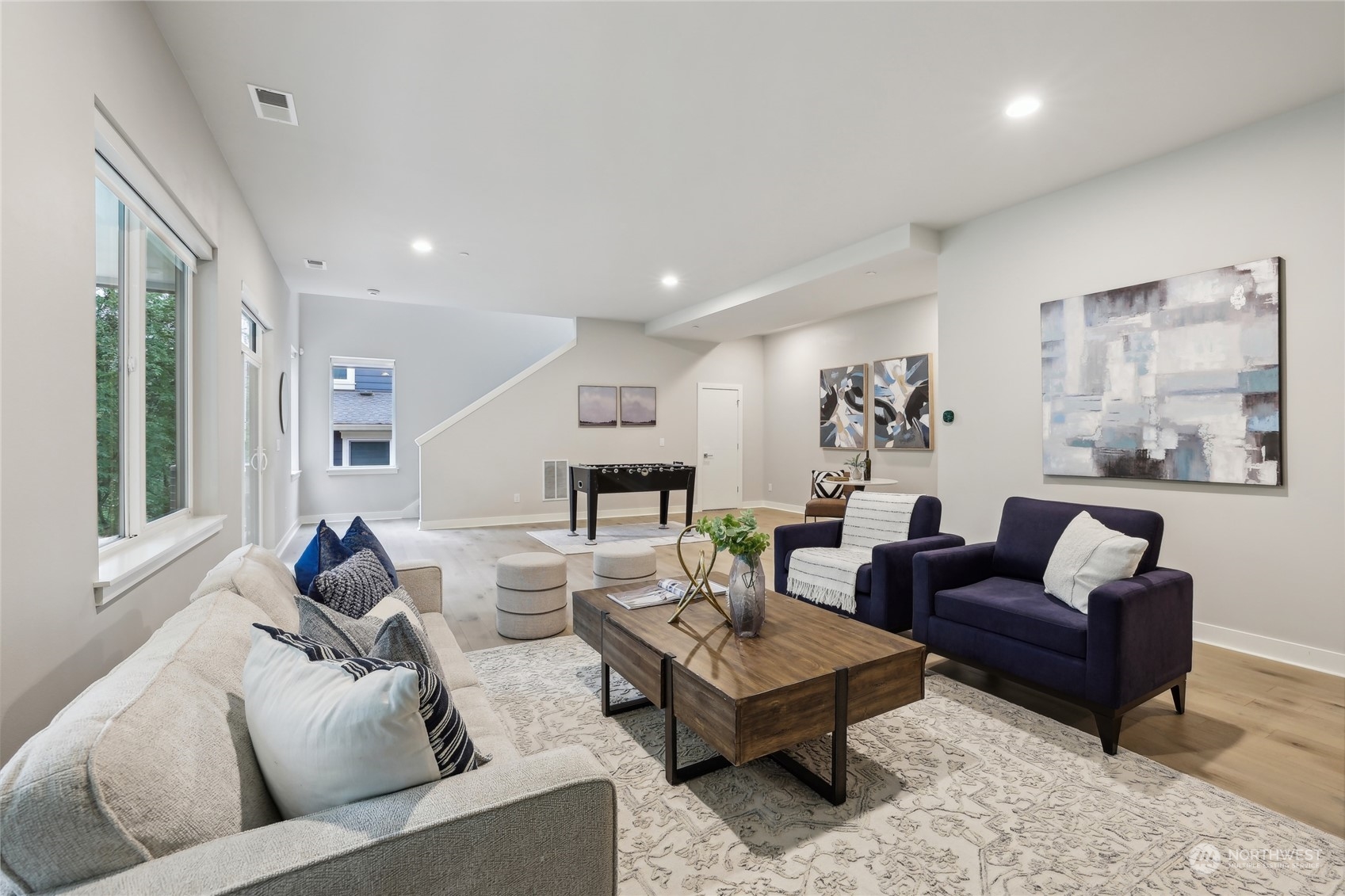 9933 Northeast 162nd Street Bothell, WA 98011 - Photo 29 of 40 a living room with furniture and a large window