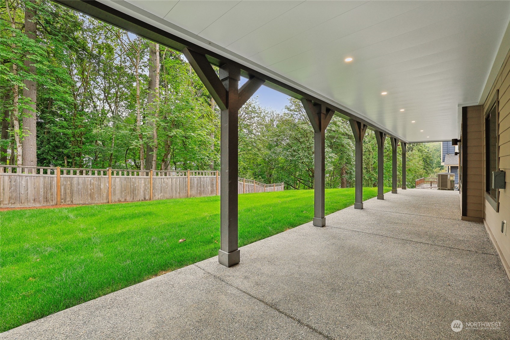 9933 Northeast 162nd Street Bothell, WA 98011 - Photo 36 of 40 a view of an interior space with a garden