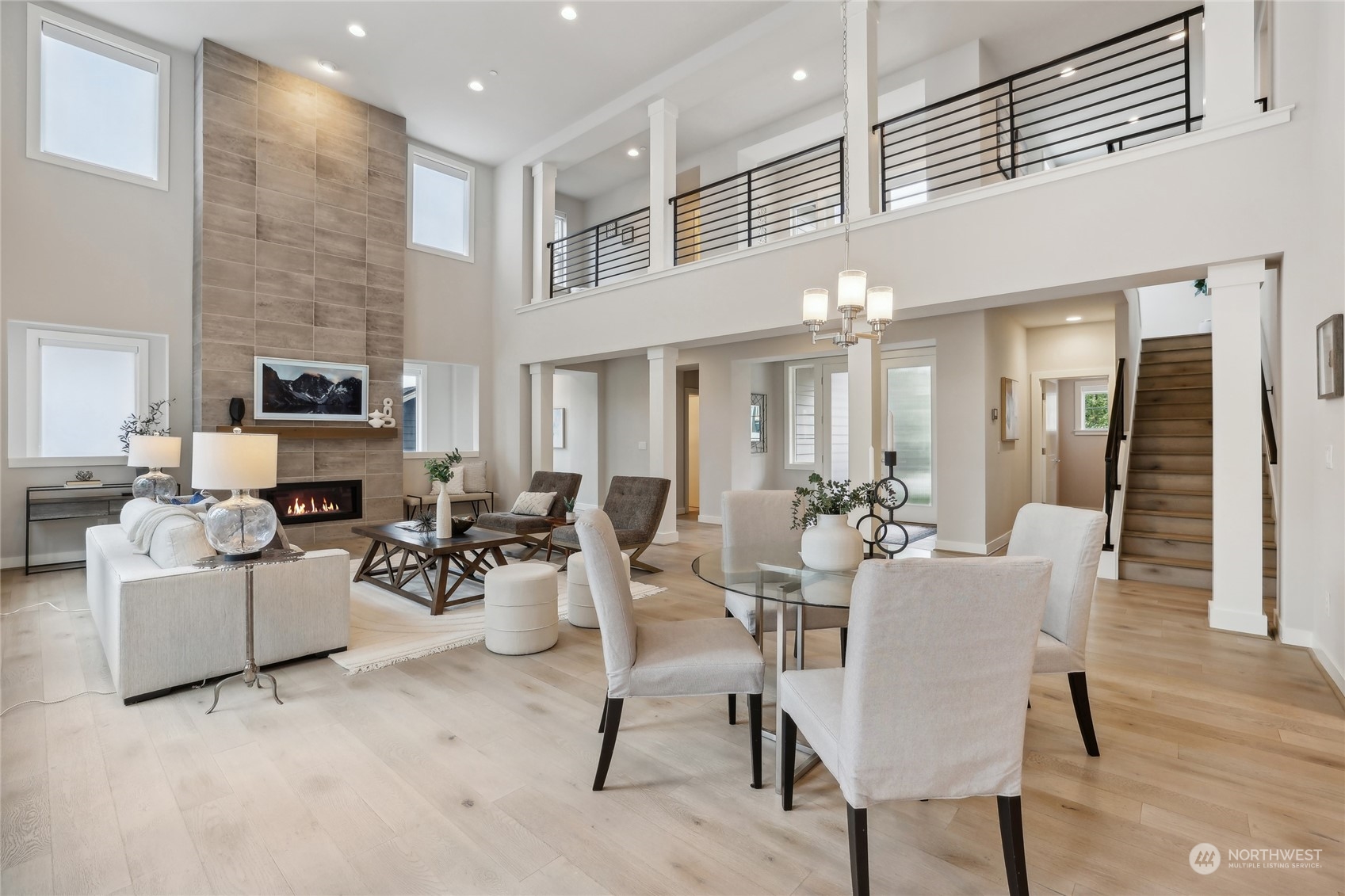 9933 Northeast 162nd Street Bothell, WA 98011 - Photo 8 of 40 a living room with furniture and a fireplace