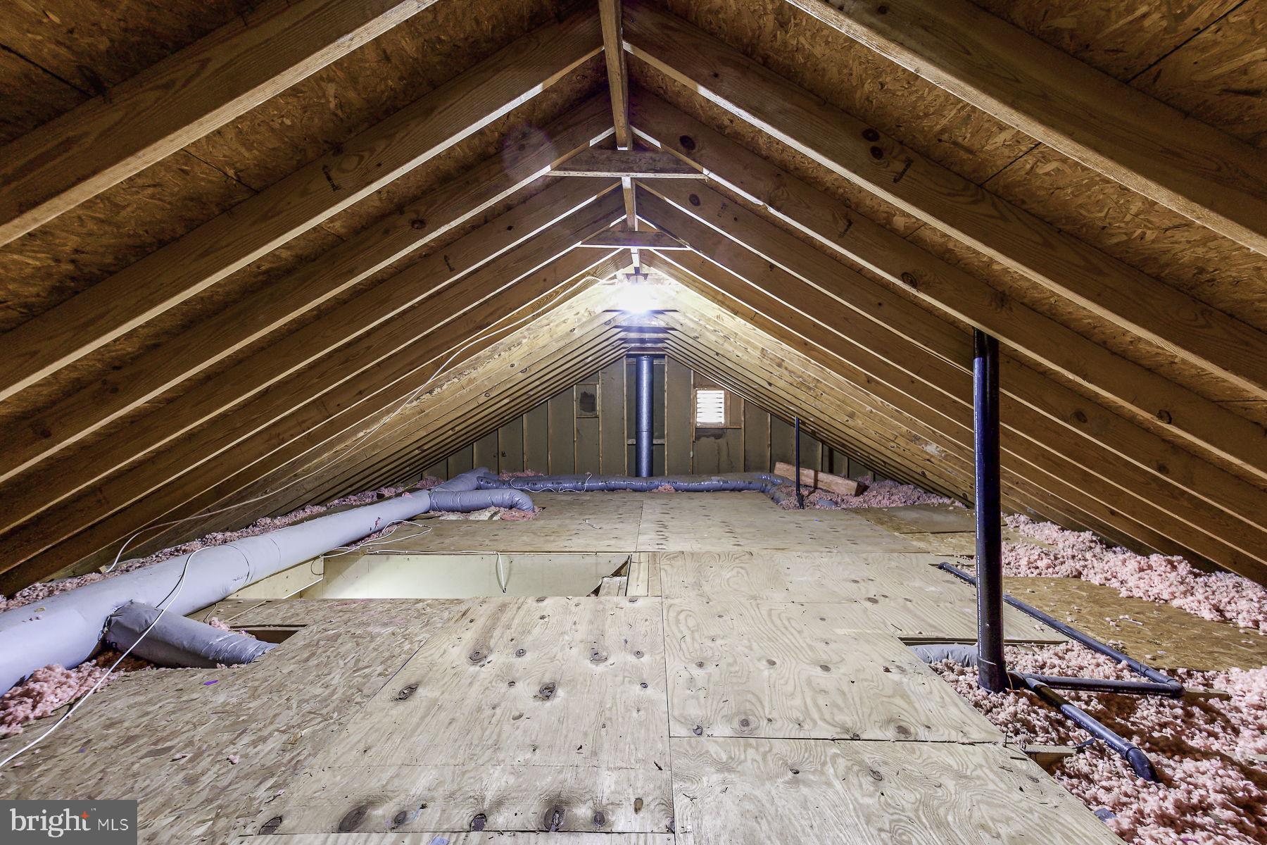 9281 Drawbridge Road Mechanicsville, VA 23116 - Photo 36 of 43 Spacious attic with wooden beams.