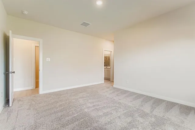 an empty room with an entryway