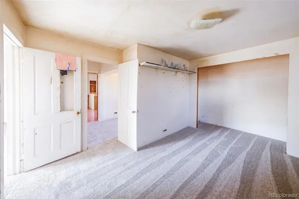 an empty room with windows